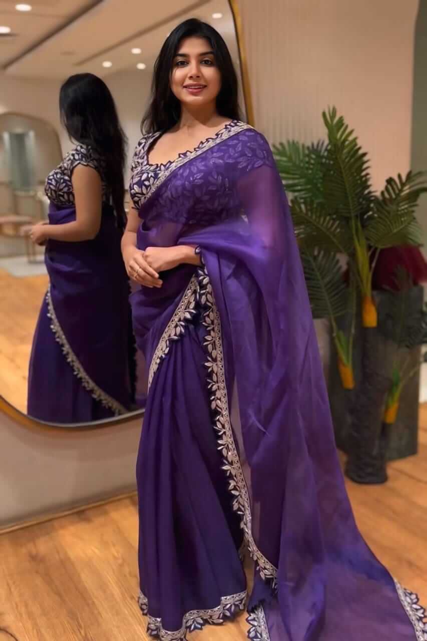 Pleasant Purple Rangoli Silk Saree With Beauteous Stitched Blouse